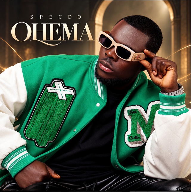 Ohema, the latest single: Specdo in a green varsity jacket and white sunglasses.